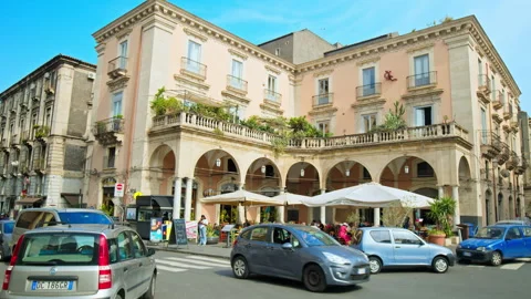 View of a building in Sicily with people sitting at the restaurant. Stock Footage 244343516