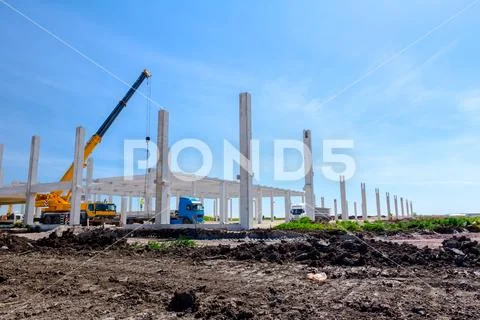 View on building site, unfinished concrete edifice. Stock Photos