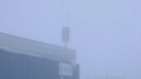 View Of A Building Under Construction And A Crane In Alps Stock Footage 81099264