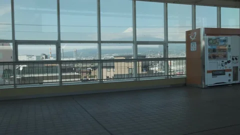 View from a bullet train Shinkansen. Shin-Fuji station and Mount Fuji. Stock Footage 128094428