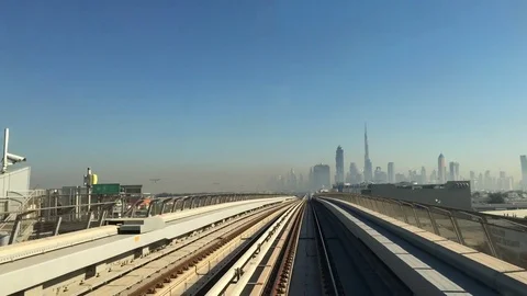 View of Burj Khalifa and panoramic city from Dubai Metro Stock-Footage 74737531