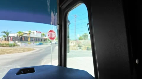 View from bus exiting airport area on island Kos with roundabout, Stock Footage 313234052