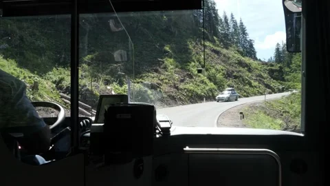 View from the bus of the winding mountain road to Zauchensee, Austria Stock Footage 157888172