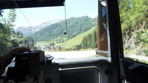 View from the bus. Winding mountain road to the ski resort Zauchensee Stock Footage 157888517