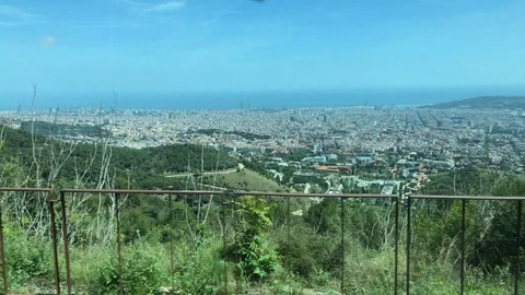 View from bus window going to Tibidabo in Barcelona Stock Footage 107991428