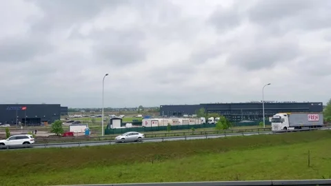 View from the bus window of a new road and traffic in Poland in spring.  Stock Footage 311952252