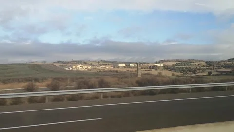 View from a bus window traveling to Girona on an autumn day, Spain Stock Footage 302899656
