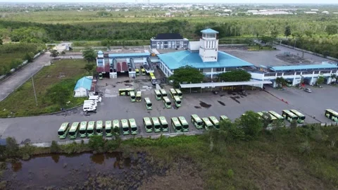 View of buses parked in a row at the bus terminal Stock-Footage 326200436