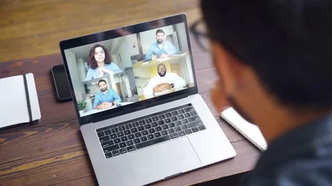 View of business man talking to colleagues about plan during video conference Stock Footage 163921813