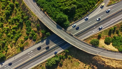 View of a busy highway intersection with vehicles traveling in different Stockbeeldmateriaal 341395892
