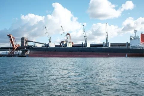 View of a busy ship loading dock in Newcastle Harbour Stock Photos