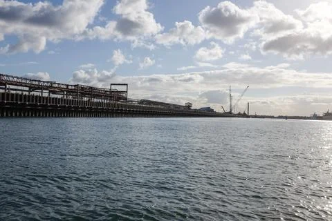 View of a busy ship loading dock in Newcastle Harbour Stock Photos
