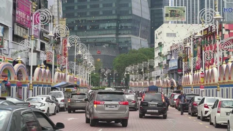 View of busy traffic in Brickfields Little India in Kuala Lumpur. 動画素材 271497522