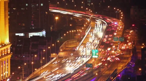 View of busy traffic over overpass at night , Shanghai, China Stock Footage 40329433