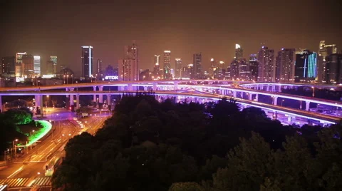 View of busy traffic over overpass at night , Shanghai, China Stock Footage 40330353
