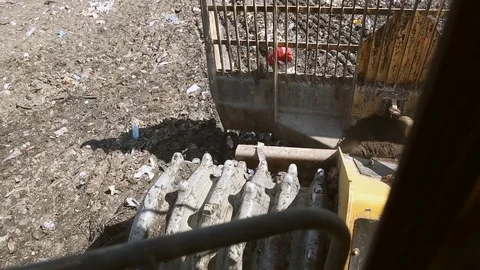 View from the cab bulldozer on a garbage dump Stock Footage 76200243