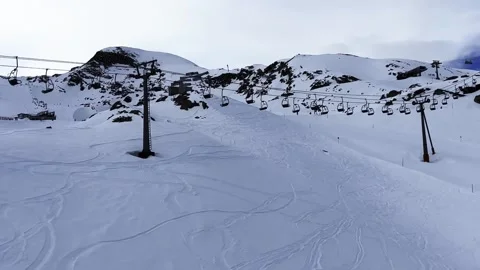 View from the cab of cable car in the Alps, on a glacier in spring. peaks in the Stock Footage 306583783