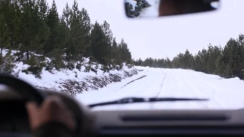 View from the cab. Mountain snowy road. Windshield. Vehicle shot. Panoramic view Stock Footage 130272553