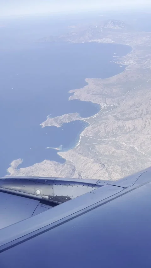 View from the cabin of an airplane flying over the peninsula. Stock Footage 236925651