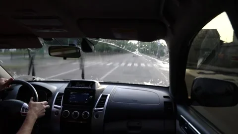 View from the cabin in motion, work wipers and glass washer. Stock Footage 156187734