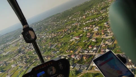 View from the cabin of the Robinson R44 helicopter. Helicopter control panel Stock Footage 200808438