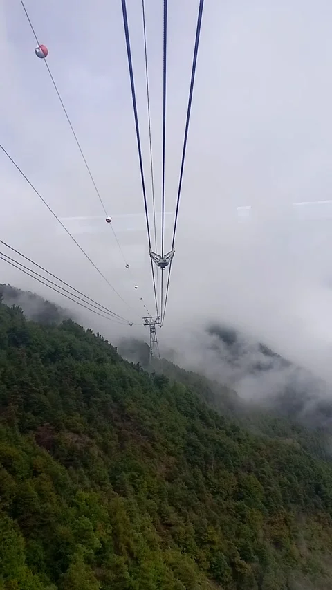 View of the cable car and a red cabin Stock Footage 287737109
