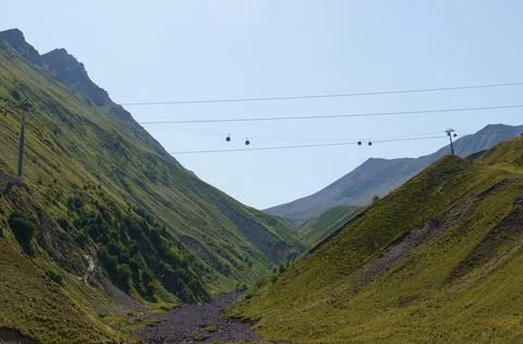 View of the cable car between the mountains. Stock Photos