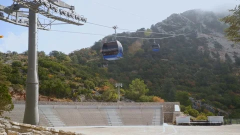 View of the cable car with cabins on mount babadak Stock Footage 169087067