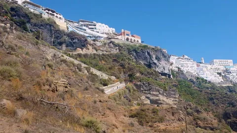 View from the cable car gondolas descending the mountain to the sea Stock Footage 334790757