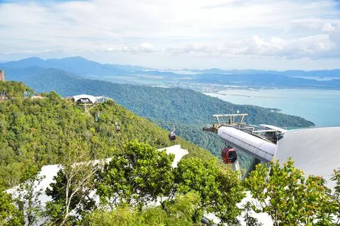 View of cable car just arrived at station with beautiful nature view. Stock Photos