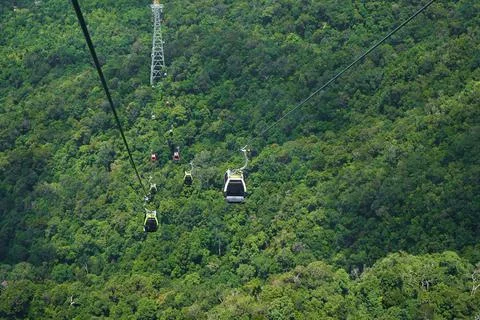 View from a cable car ride high into the mountains on the tropical island of  Stock Photos