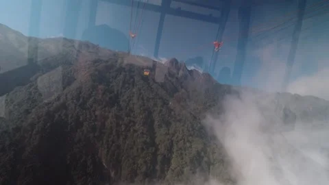 View From Cable Car Through Clouds at Fansipan, Sapa, Vietnam Stock Footage 328647955