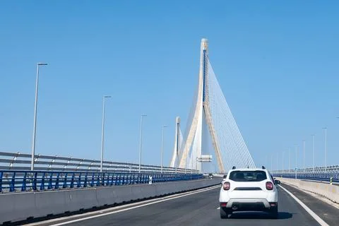 View on cable-stayed bridge with high pylonsacross theBay of Cadiz, linking.. Stock Photos