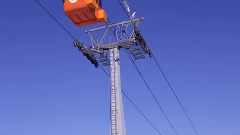 View of cableway gondola cable car on blue sky background Stock Footage 87907867