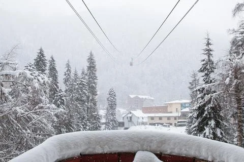 View from cableway station in the strong snowfall in the mountains Stock Photos