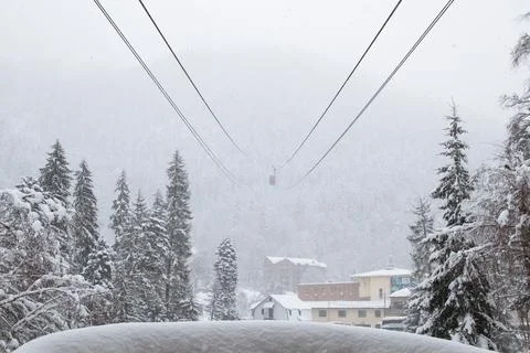 View from cableway station in the strong snowfall in the mountains Stock Photos
