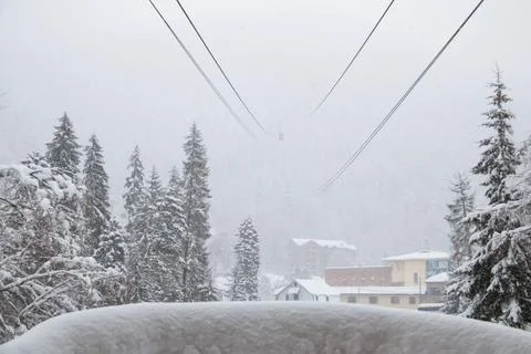 View from cableway station in the strong snowfall in the mountains Stock Photos