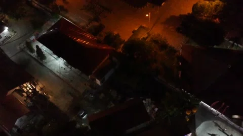 View cafe at night using drones Video stock 235480450