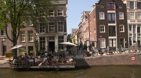 View of a cafe terrace on the canal Stock Footage 68941506