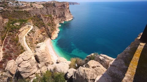 View to the Cala del Moraig - beautiful beach in Benitachell, Costa Blanca,.. Stock Footage 305033783