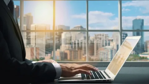 View of Calgary Alberta Canada .Close up hand Businessman using laptop Stock Footage 84578959