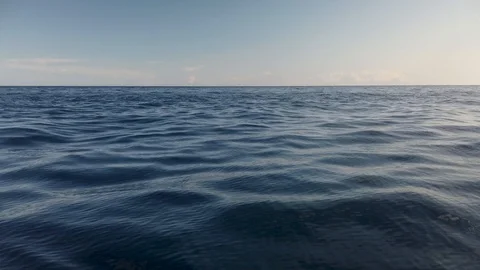 View of calm ocean water surface with small waves and empty horizon, slow Stock Footage 116744626