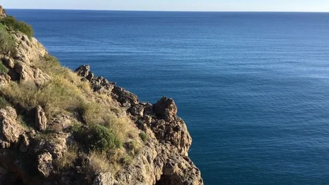 View of the calm sea from the cliffs Stock Footage 123591908