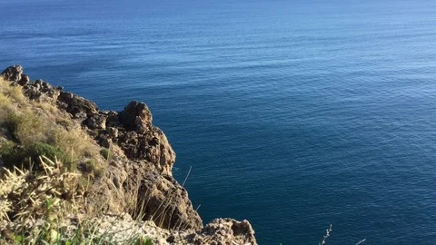 View of the calm sea from the cliffs Stock Footage 123592214