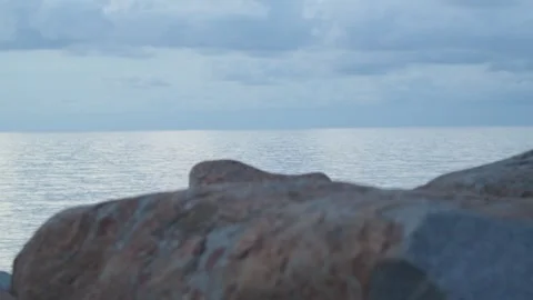 View of a calm sea in the evening Stock Footage 282060340
