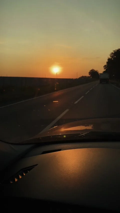 View of the calm sunset from the interior of the car Stock Footage 317781818