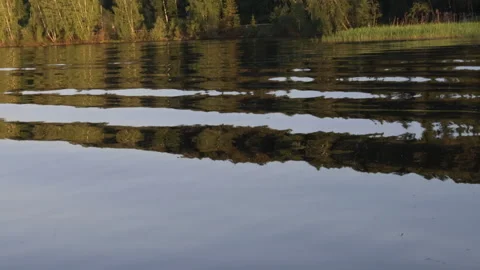 View of calm waves on the river in spring Stock Footage 276722736