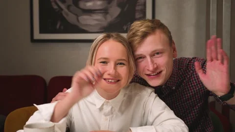 View from camera. happy couple has video call chatting with friends and family Video stock 146602073