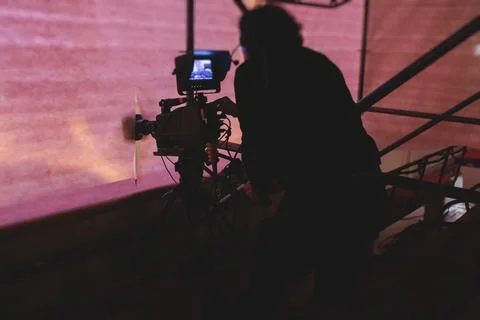 View of a camera man operator working during tv reportage, online broadcast.. Foto stock