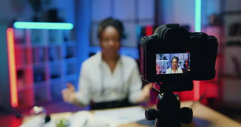 View on camera screen on attractive confident high-skilled african american Stock Footage 166573324